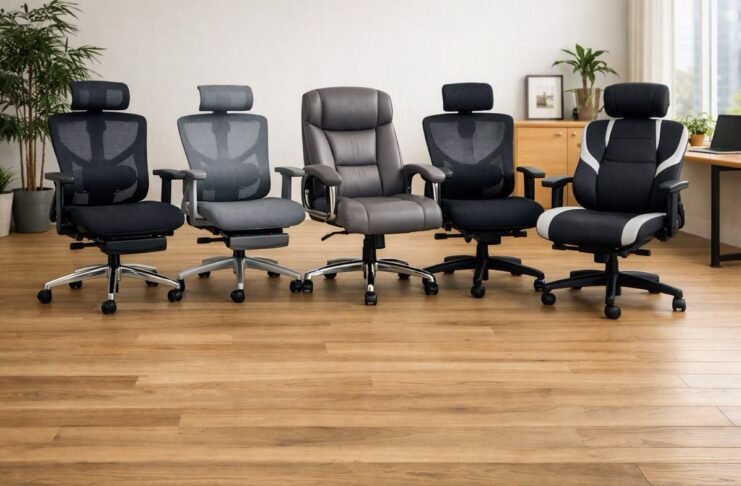 Five ergonomic office chairs arranged in a bright modern workspace with wooden flooring, indoor plants, and natural light — showcasing comfort and style for hybrid work wellbeing.